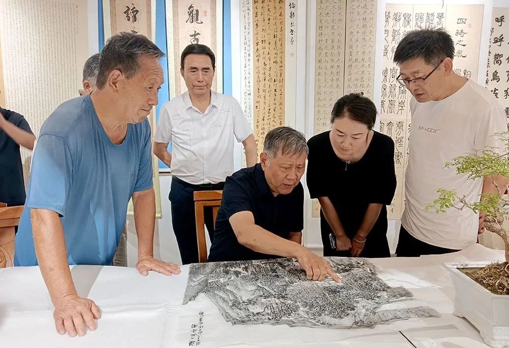 翰墨润中原赋能乡村美育丨我校与温县举行共建大学生社会实践基地揭牌仪式 图片